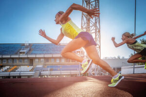 two women sprinting